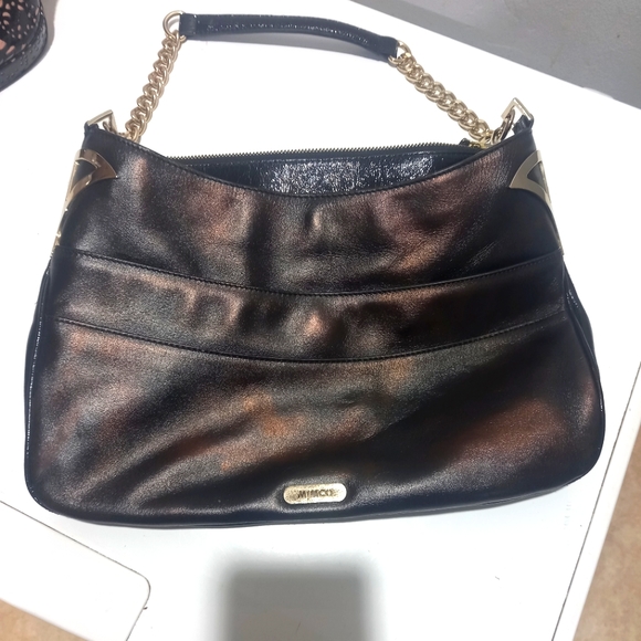 Mimco Handbags - Mimco vintage black and bronze shoulder bag with gold hardware.